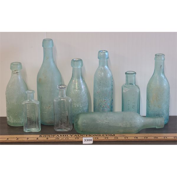 LOT OF 9 - GLASS TORPEDO & SODA AQUA BOTTLES, ETC - TORONTO