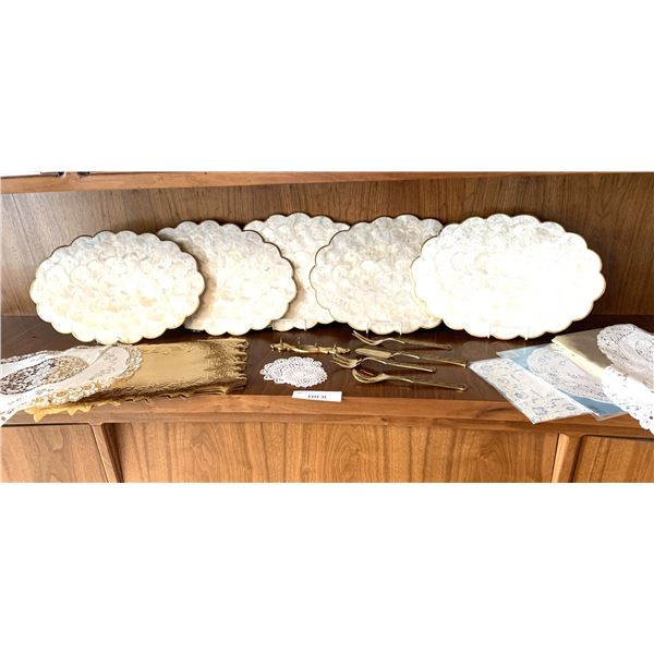 shell scalloped place mats (5) Gold serving utensils with holder, doilies, Gold table cloth
