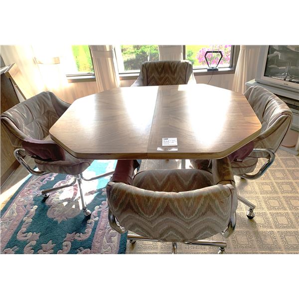 Kitchen table with 4 chairs with arms  48"L x 36" W x 30"H. Extra Leaf 11 3/4"