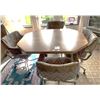 Image 1 : Kitchen table with 4 chairs with arms  48"L x 36" W x 30"H. Extra Leaf 11 3/4"