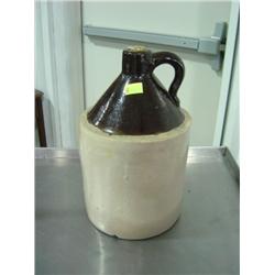 GALLON SIZE WHISKEY JUG; BROWN OVER WHITE; HAS AGE & CHIP MARKS