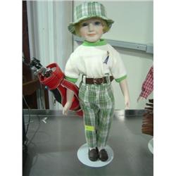 DOLL ON STAND GOLF PLAYER WITH BAGS; #229/500