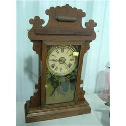 OAK CASE MANTLE STYLE CLOCK; WORKING; GLASS HAS SAILBOAT & LIGHTHOUSE PAINTED SCENE