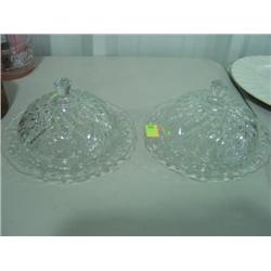PAIR OF CLEAR GLASS PRESSED GLASS BUTTER DISHES; 1 HAS CHIP ON LID & TRAY