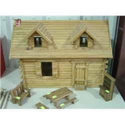 LOG CABIN STYLE DOLL HOUSE WITH FURNITURE PIECES; APPROX. 15 DEEP; 26 WIDE; 18 TALL