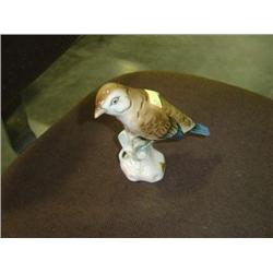 ROYAL DUX BOHEMIA BIRD PERCHED ON TREE