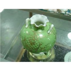 SMALL 3-FOOTED GREEN VASE; HAS CHIP ON TOP OF RUFFLE