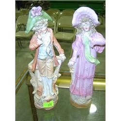 PAIR OF BISQUE COLONIAL FIGURINES; MOLD CRACK ON MAN'S NECK & FINGER