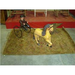 AREA RUG 3'11" X 5'10"; MISSING SOME FRINGE DAMAGE