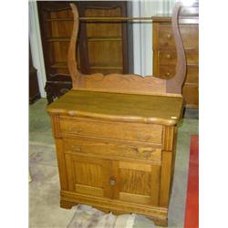 OAK WASH STAND WITH TOWEL BAR; 2 DRAWERS OVER 2 DOORS; 33W X 17D X 54H (WITH TOWEL BAR)