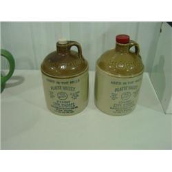 LOT OF 2 WHISKEY JUGS; MCCORMICK DISTILLING COMPANY