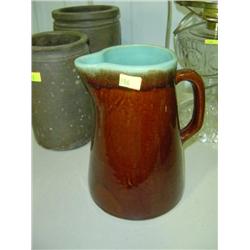 POTTERY WATER PITCHER; 9 INCHES