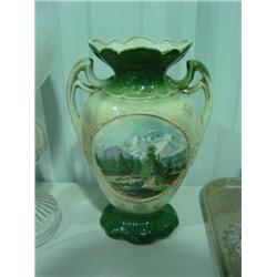 DOUBLE HANDLED PAINTED VASE, MADE IN ENGLAND; CHIPS IN GLAZE ON HANDLE