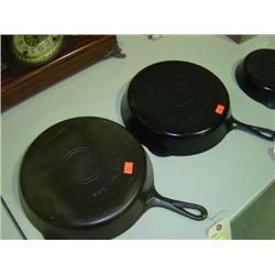 LOT OF 2 GRISWALD #10 SKILLET WITH LARGE LOGO AND #9 SKILLET WITH LARGE LOGO (#10 HAS CRACK; #9 SHOW