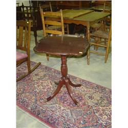 MAHOGANY PEDESTAL LAMP TABLE; BRASS CLAW FEET 22 INCHES SQUARE X 27" HIGH
