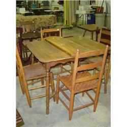 OAK FARM STYLE TABLE (2) BOARDS; (4) CHAIRS; 2 CHAIRS SHOW WEAR IN THE CANE BOTTOM