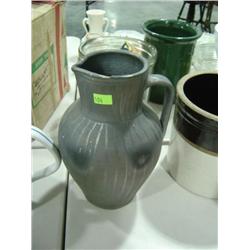POTTERY WATER PITCHER; HAS CHIP
