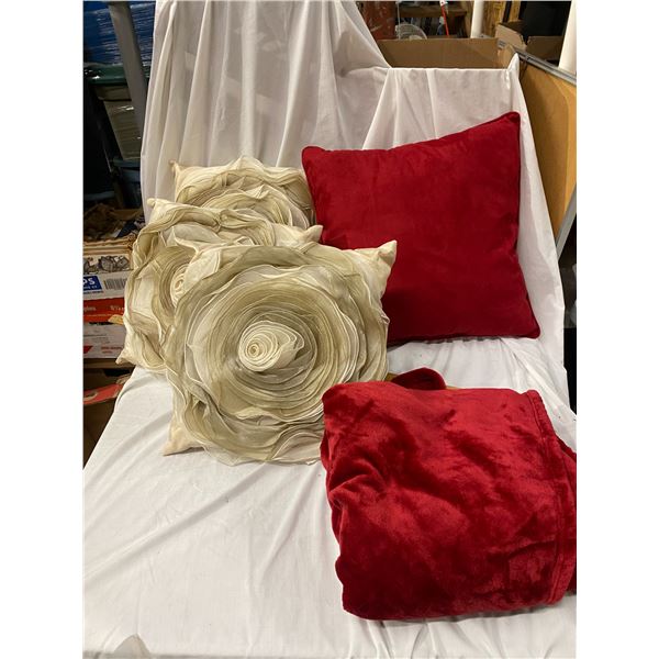 Denver Hayes soft blanket and assorted throw pillows
