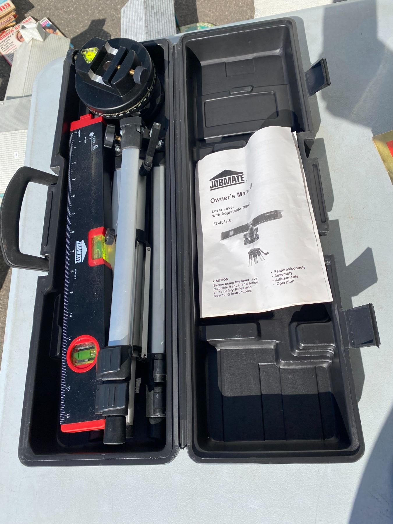 Laser level with adjustable tri pod