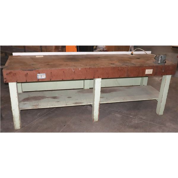 POWERED WOOD WORKBENCH WITH VICE ATTACHED AND