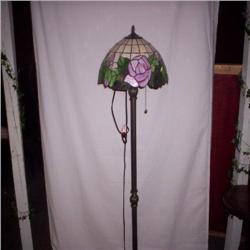 Floor lamp with a lead glass shade
