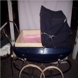 Pedigree Baby stroller (small tear in fold top)