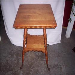 Oak lamp stand with brass ball and claw foot