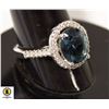 Image 1 : #209-8X10 MM OVAL BLUE STONE WITH CLEAR STONE HALO