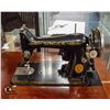 Image 2 : SINGER SEWING MACHINE IN WOOD CABINET