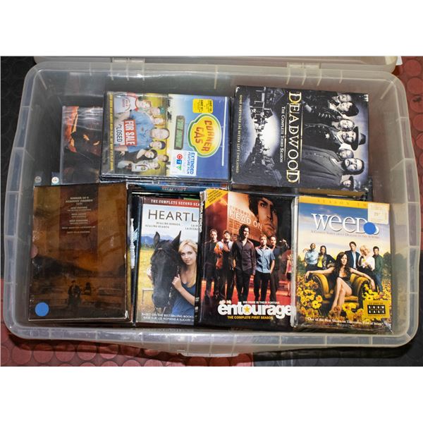 TOTE OF VHS AND DVDS