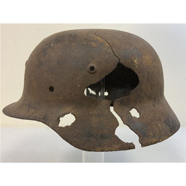 WWII GERMAN M35 HEAVY COMBAT DAMAGED HELMET FROM RUSSIAN FRONT