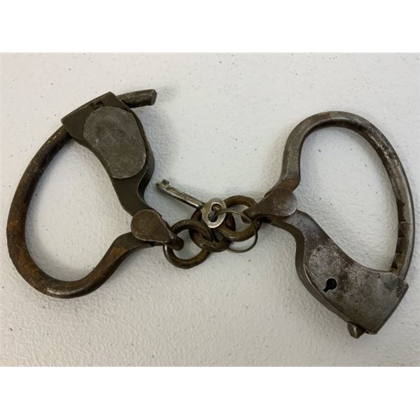 ANTIQUE PAIR OF HANDCUFFS WITH KEY