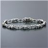 Image 2 : New 14K White Gold 7" .33 ctw Bezel Set Diamond & Figure "X" Link Tennis Bracele