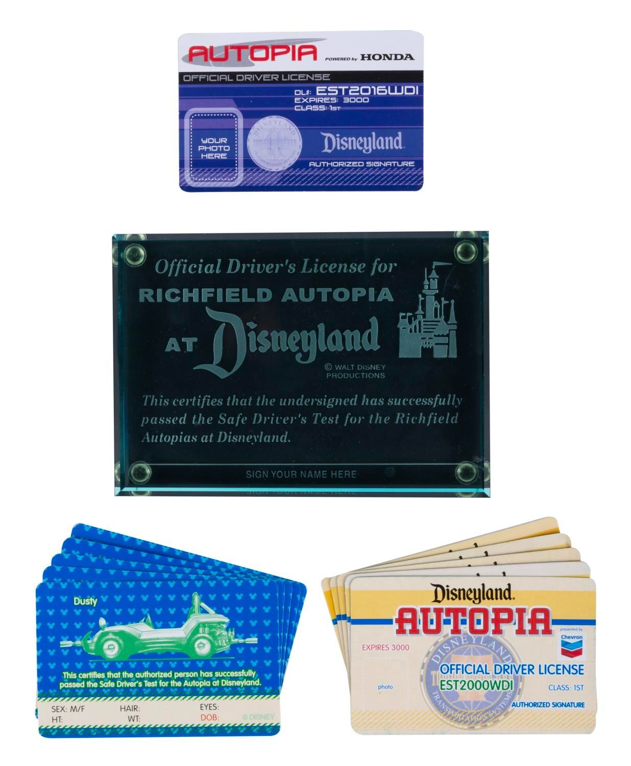 A Disneyland Autopia Paperweight & Driver's Licenses. - Van Eaton Galleries