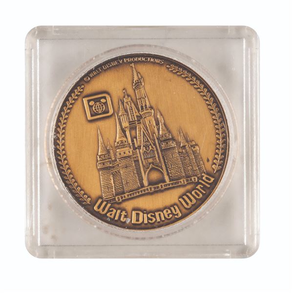 A Walt Disney World Commemorative Medallion Coin.