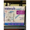 Image 1 : WATERPIK WATER FLOSSER CORDLESS PEARL AND ULTRA PLUS