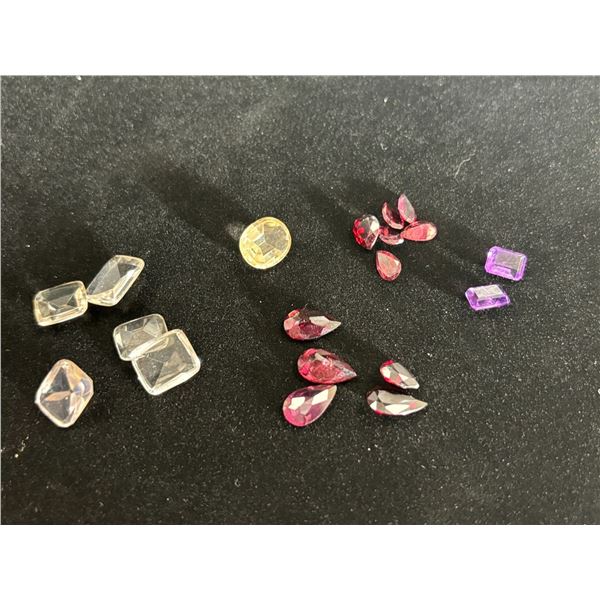 ASSORTED GEMS INCLUDING; 5 CLEAR CITRINE, 11 GARNETS, CITRINE, &2 AMETHYSTS.