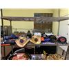 Image 4 : SHELF LOT OF ASSORTED ITEMS INCLUDING; COWBOY HATS, ASSORTED TEAM HATS AND MORE