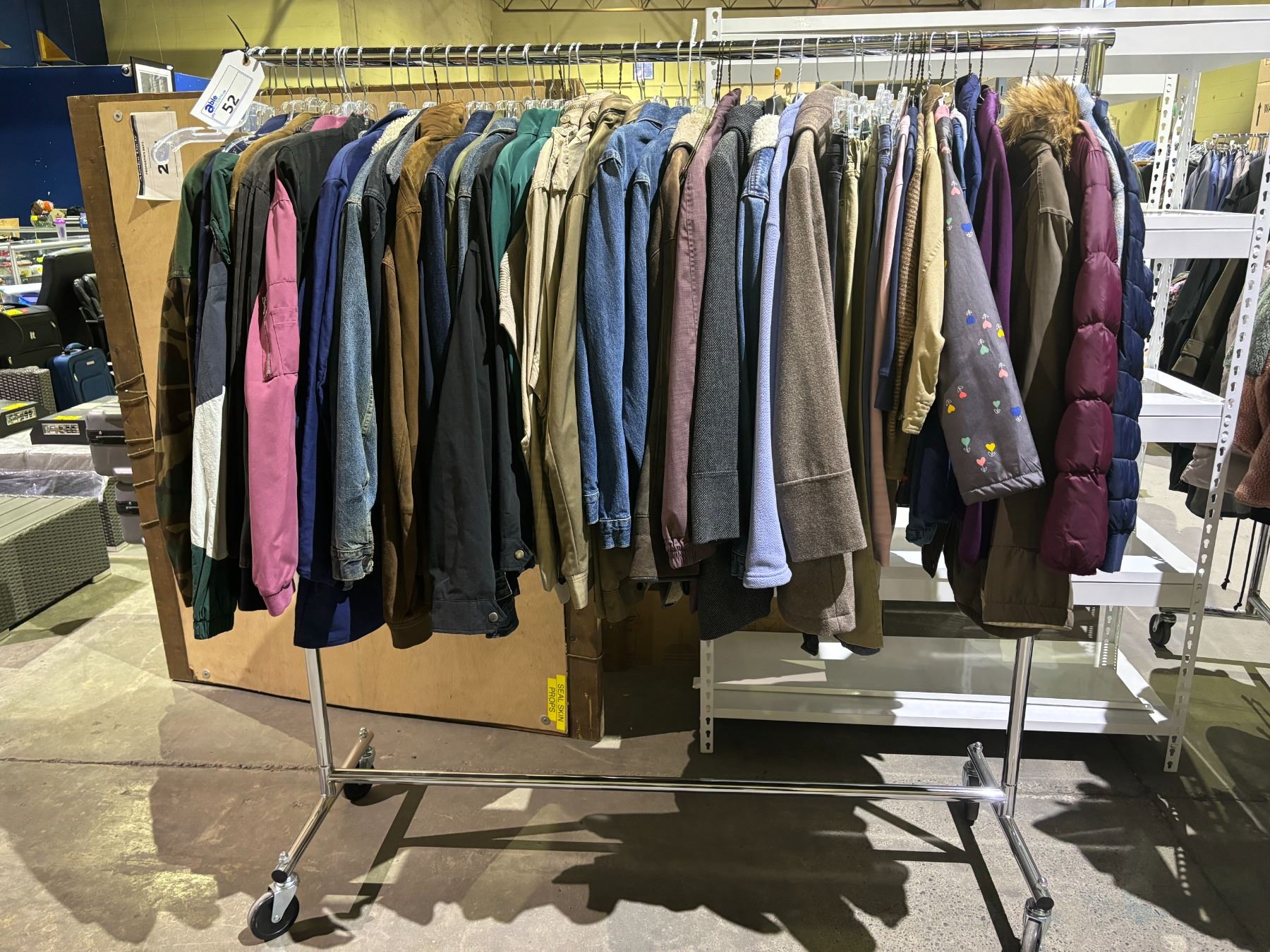 RACK OF ASSORTED CLOTHING INCLUDING; JACKETS & PANTS (RACK INCLUDED ...