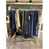 Image 1 : RACK OF ASSORTED CLOTHING INCLUDING; SKIRTS, YOGA PANTS, JEANS & MORE (RACK INCLUDED)