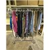 Image 1 : RACK OF ASSORTED CLOTHING INCLUDING; YOGA PANTS, TANK TOPS, LONG SLEEVE SHIRTS & MORE (RACK