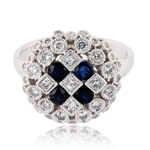 0.70 ctw Diamond and 0.66 ctw Blue Sapphire Platinum Ring