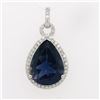 Image 1 : Glamorous Iolite and Diamond Halo Pendant