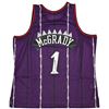 Image 1 : TRACY MCGRADY SIGNED TORONTO RAPTORS MITCHELL AND NESS SWINGMAN JERSEY (BECKETT COA)