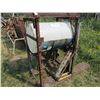 Image 1 : plastic 45 gallon drum set up to be used for watering