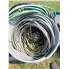 Image 2 : Lot of assorted garden hose  And flow tech submersible sump utility pump