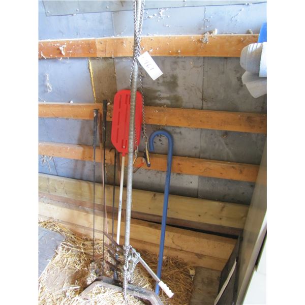 Calf puller with chains, herd paddles and horse whips