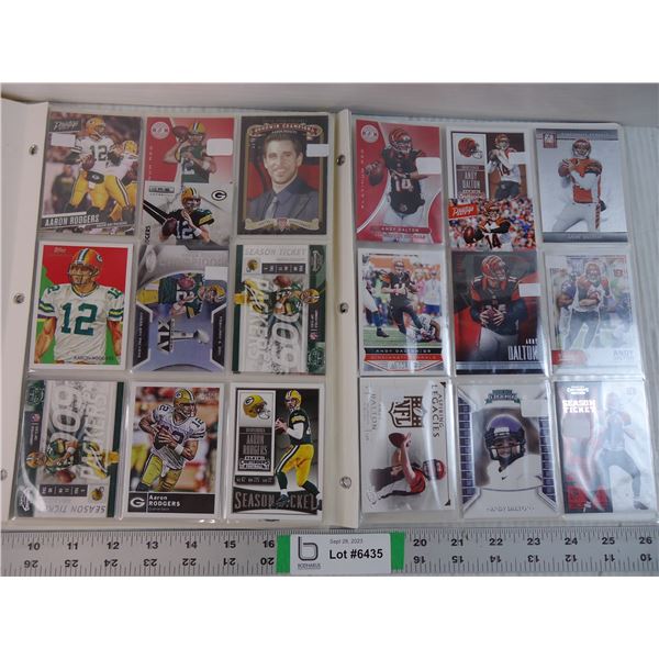 (2) Folders of Cards Featuring Aaron Rodgers and Andy Dalton