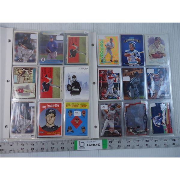 (2) Folders of Cards Featuring Roy Halladay and Roberto Alomar