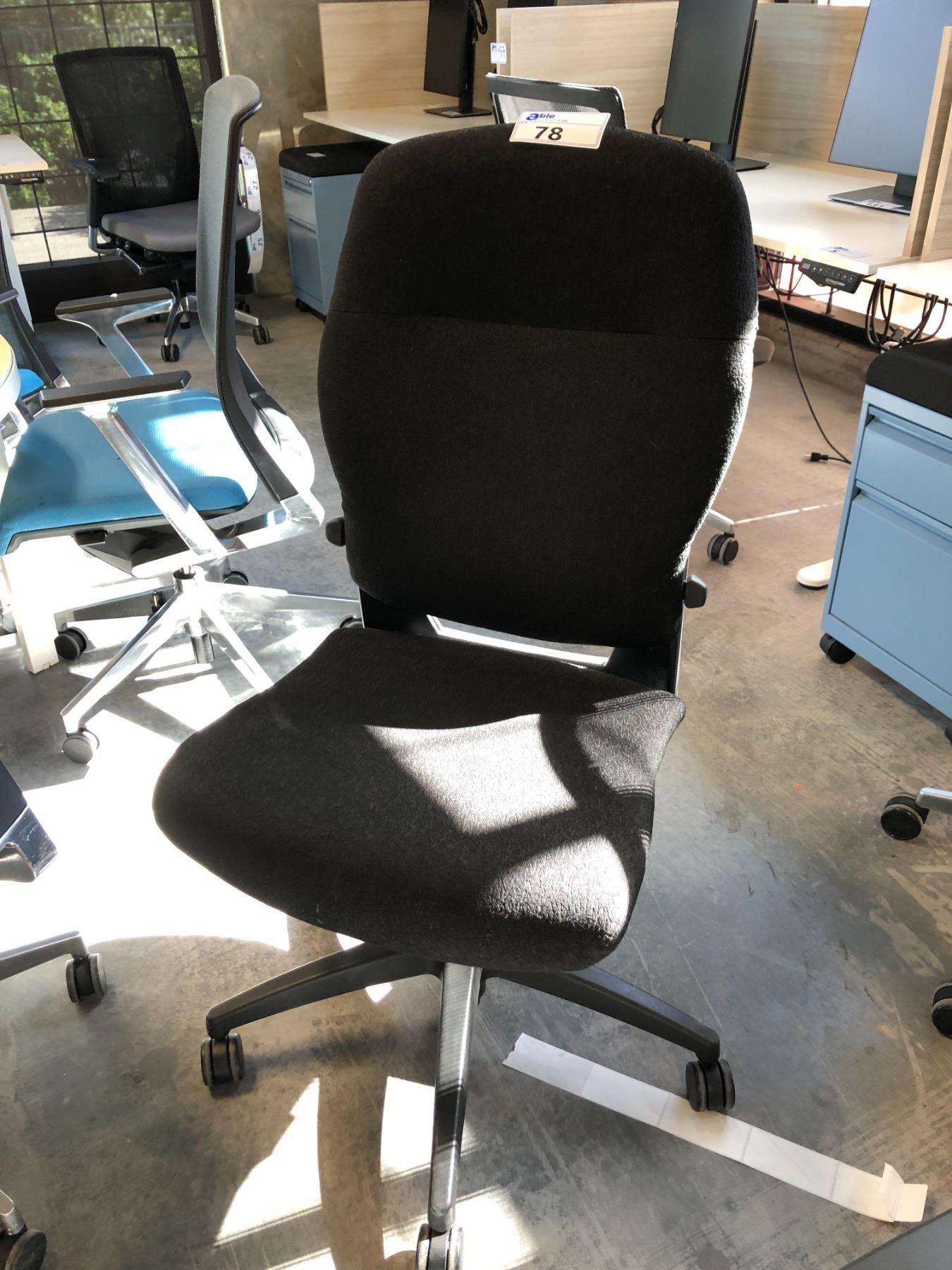 TEKNION BLACK ARMLESS TASK CHAIR